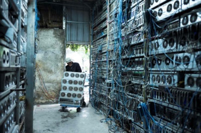 Bitcoin mining farm in Canada with rows of mining rigs operating efficiently